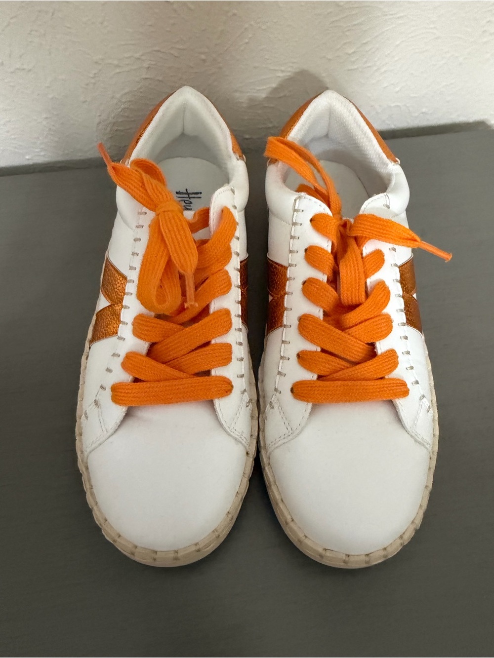 Corky’s women’s White Sneakers with Orange Accents and Laces. Game Day